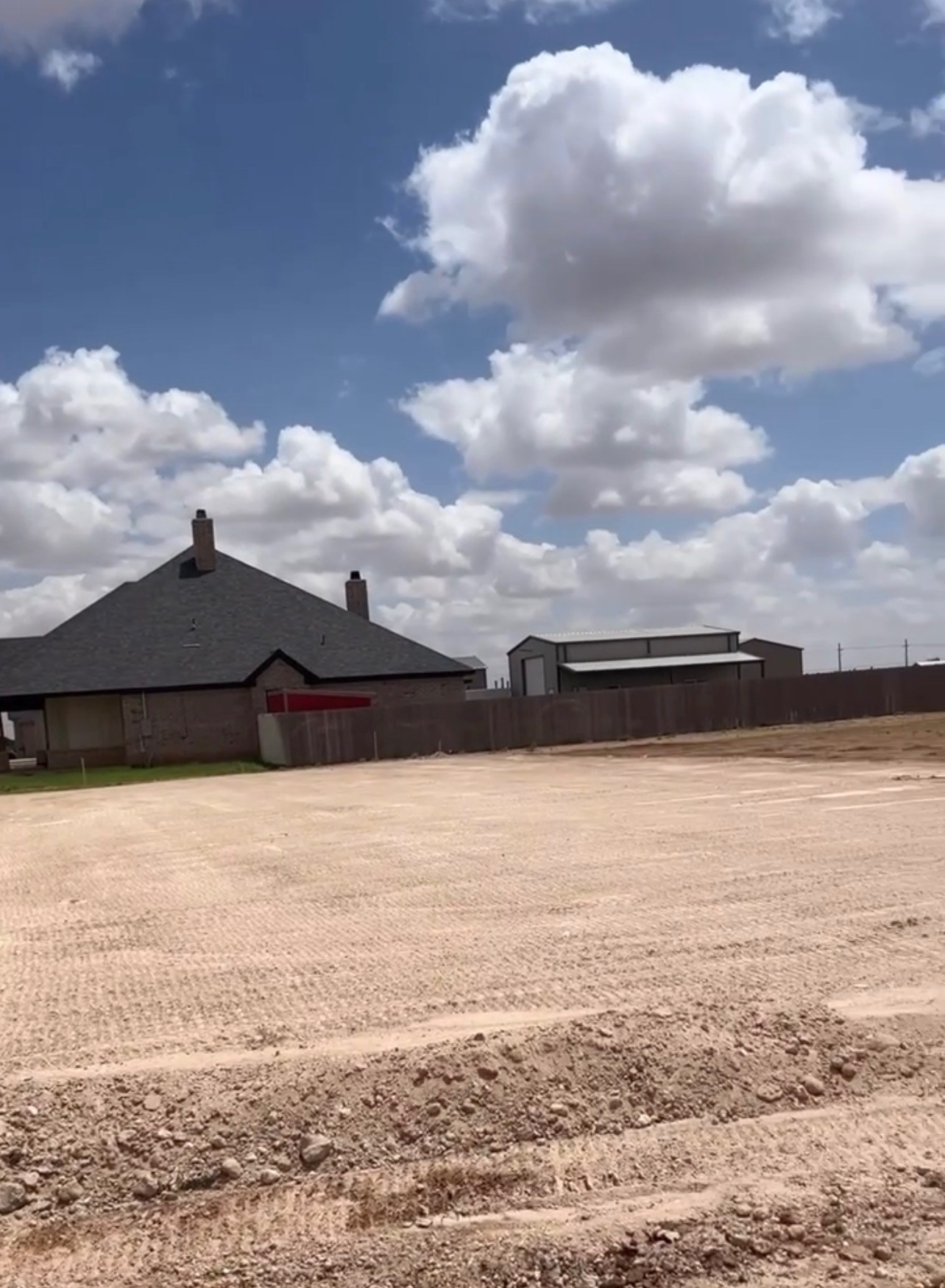 Gravel and caliche spreading